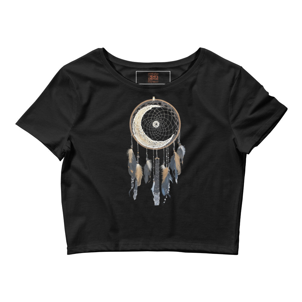 Black crop tee laid flat with moonlit dreamcatcher design and feather details.
