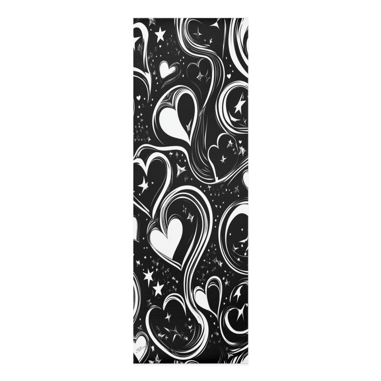 A sleek black yoga mat with flowing white heart designs and star patterns, ideal for a stylish and elegant yoga practice
