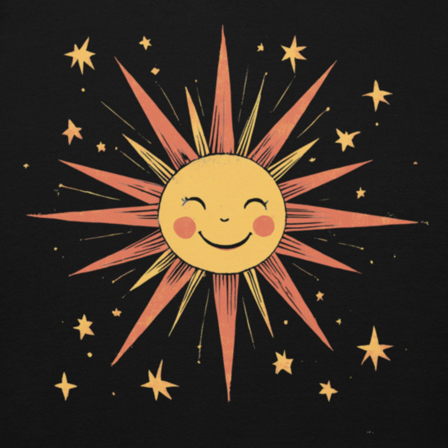 Close-up of yellow sun design with stars on black hoodie.