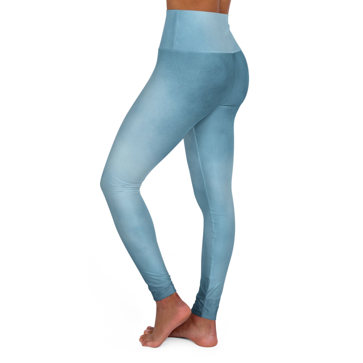 Back view of high-waisted blue leggings featuring a seamless gradient design for a flattering and stylish look