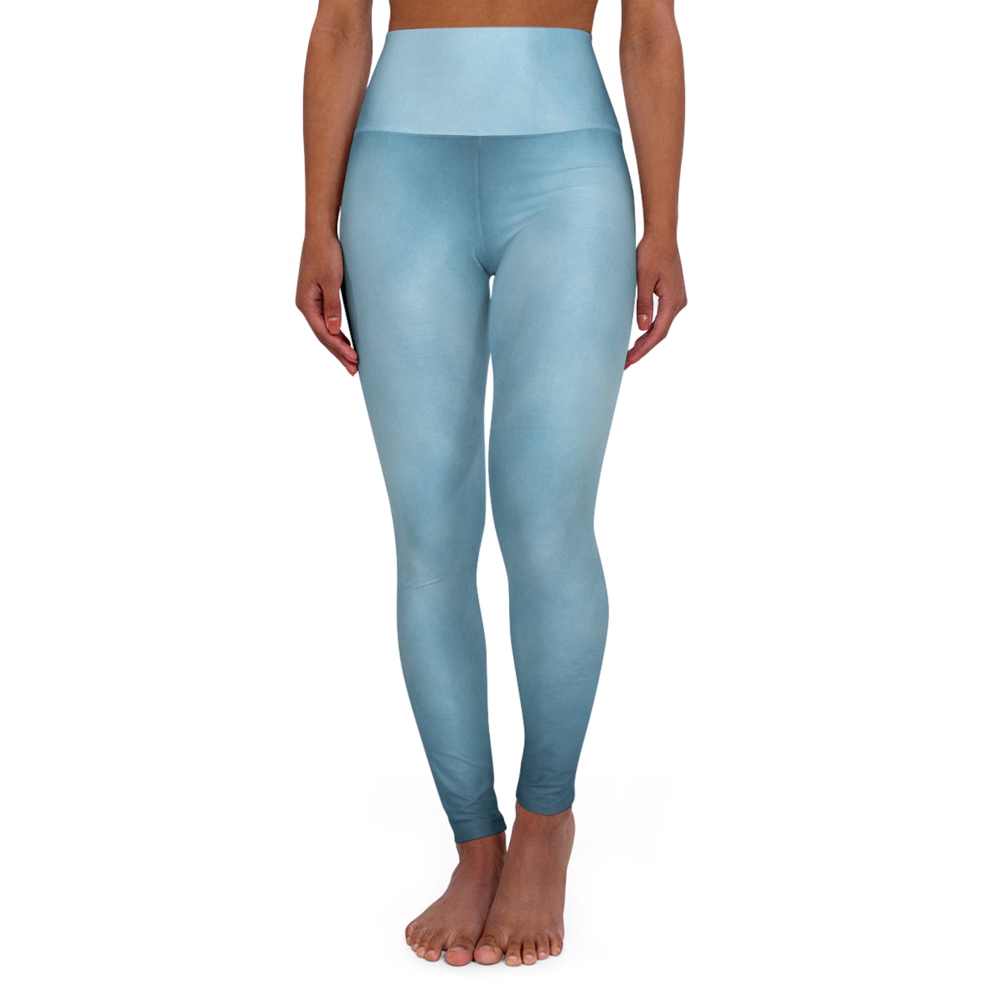 Front view of high-waisted blue leggings with a smooth, gradient texture, showcasing a sleek and comfortable fit.