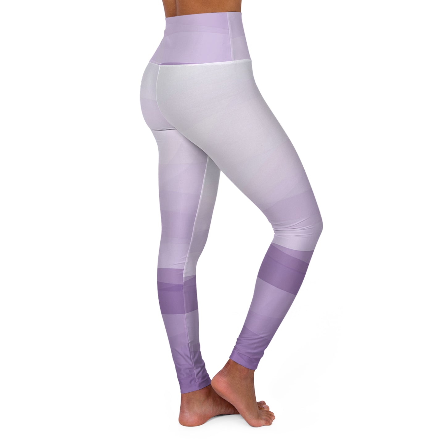 Side view of high-waisted lavender and white gradient leggings, showcasing a stylish pattern