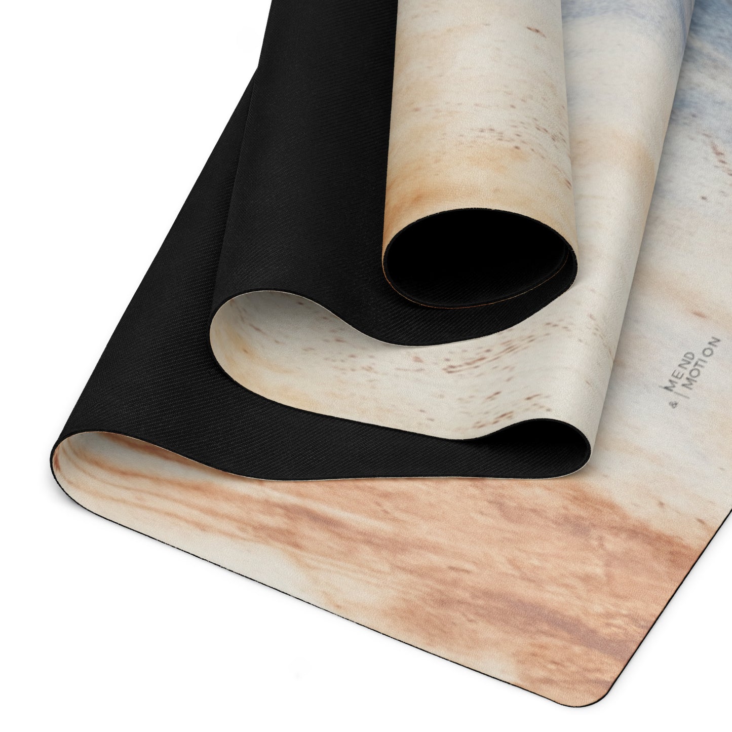 Rolled view of a yoga mat with an abstract watercolor design in earthy tones, highlighting its soft texture and durable black non-slip backing.