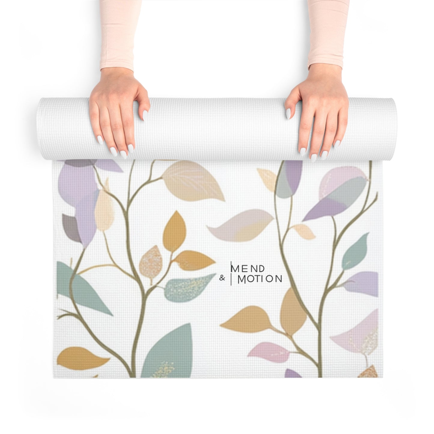 A person unrolling the floral mandala yoga mat with soothing pastel designs