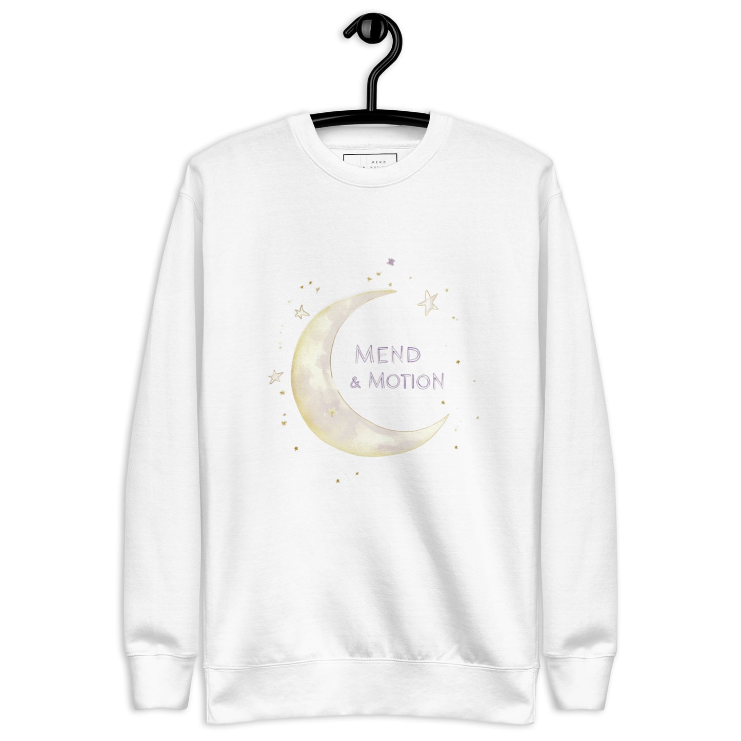 White sweatshirt with a crescent moon and "Mend & Motion" text surrounded by delicate stars