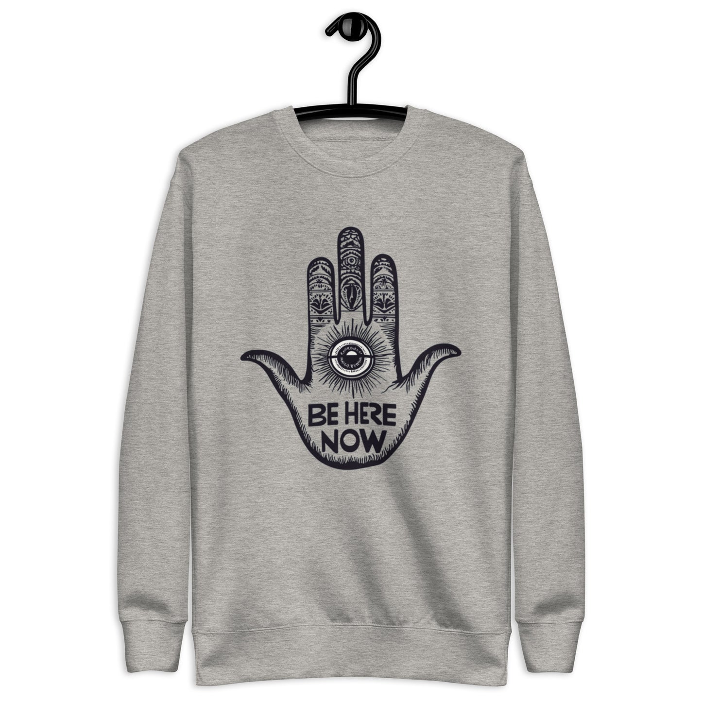  Carbon grey sweatshirt with an artistic hand design and the words 'Be Here Now' in bold typography