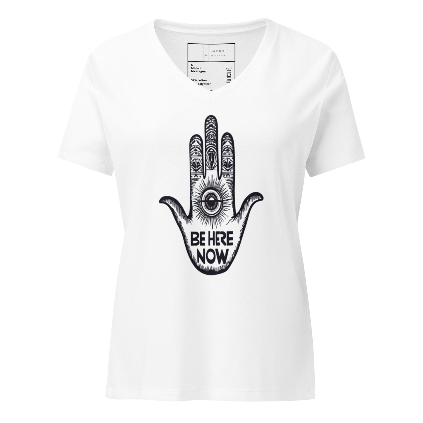 White V-neck T-shirt featuring a minimalist hamsa design with "Be Here Now" text and a central all-seeing eye in black.