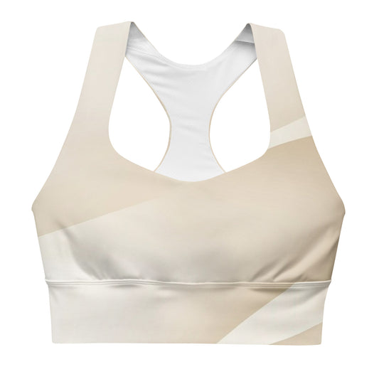 Front view of a beige geometric pattern longline sports bra with a racerback design and soft fabric for maximum comfort and support.