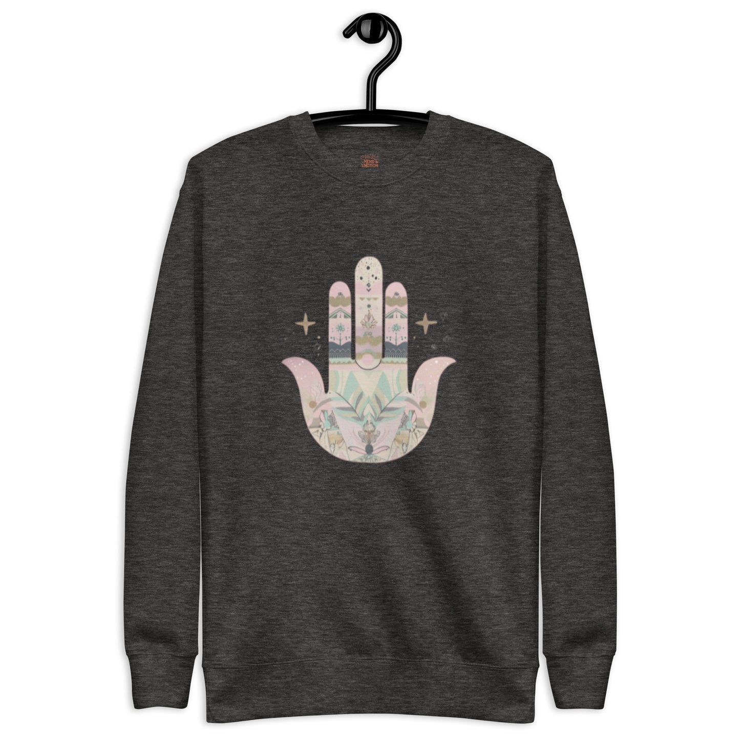 A dark heather gray sweatshirt featuring a pastel-colored Hamsa hand design with floral and geometric elements, displayed on a hanger.
