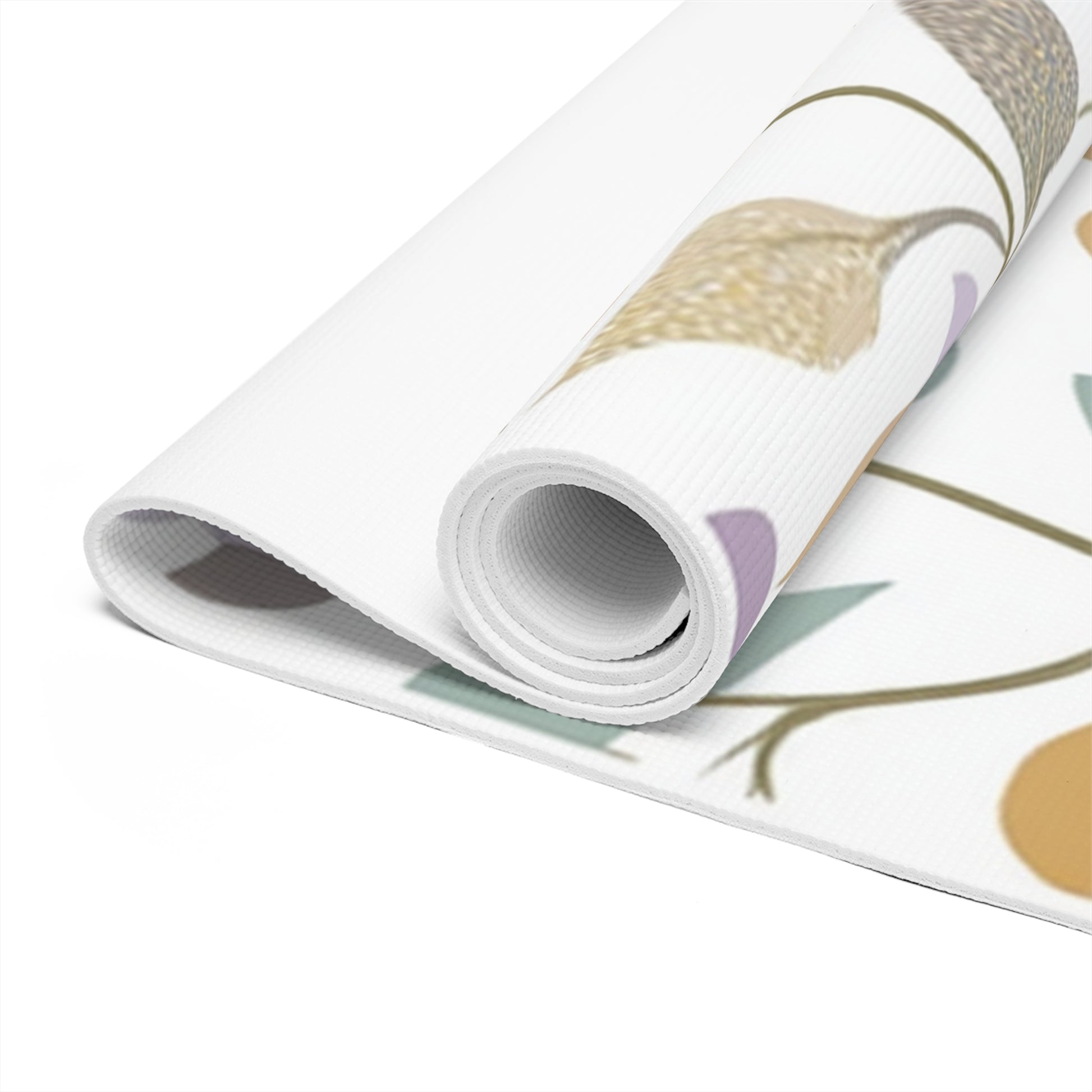 Close-up view of the floral mandala yoga mat texture highlighting its detailed pastel patterns