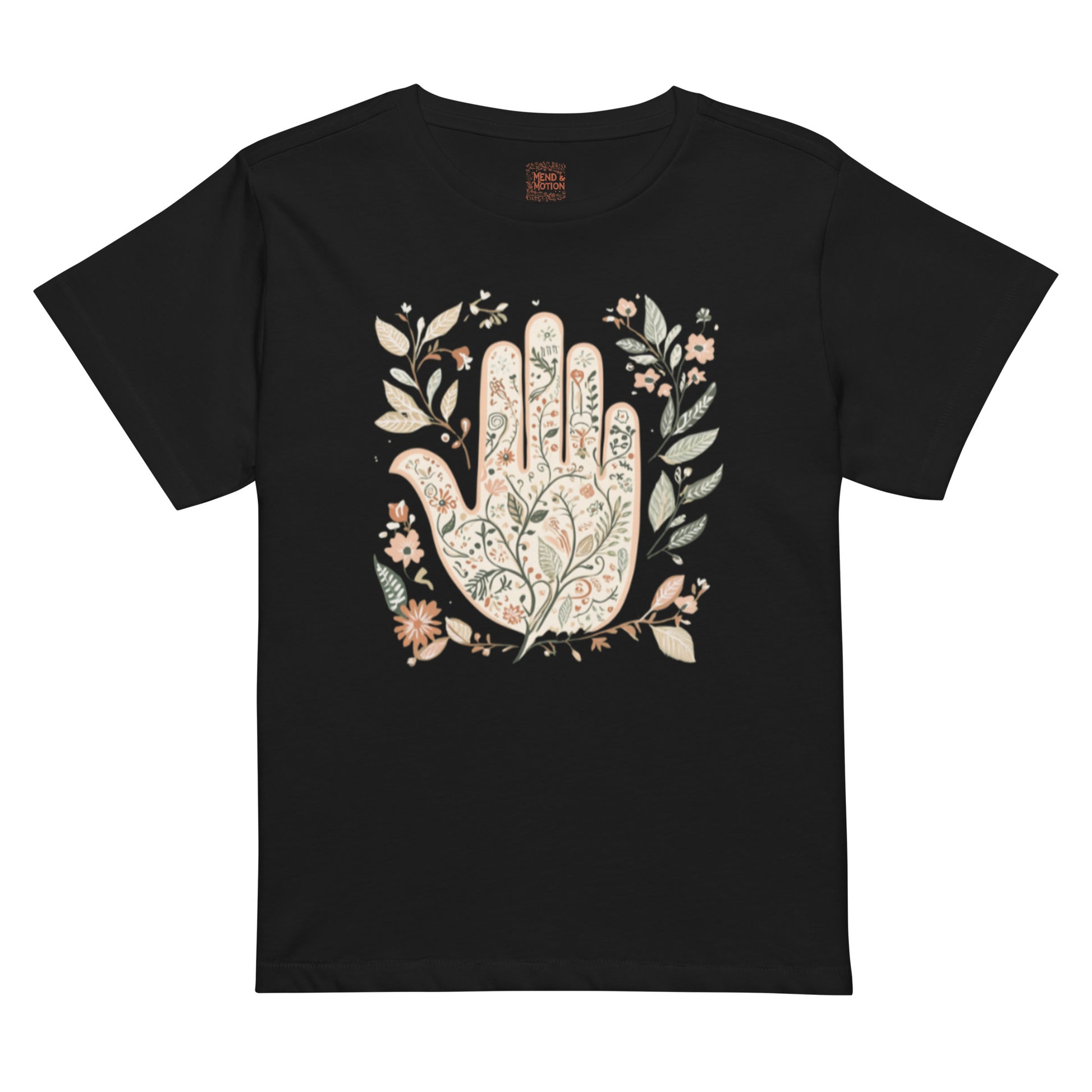 Black high-waisted tee featuring a floral Hamsa hand surrounded by delicate leaves and flowers.