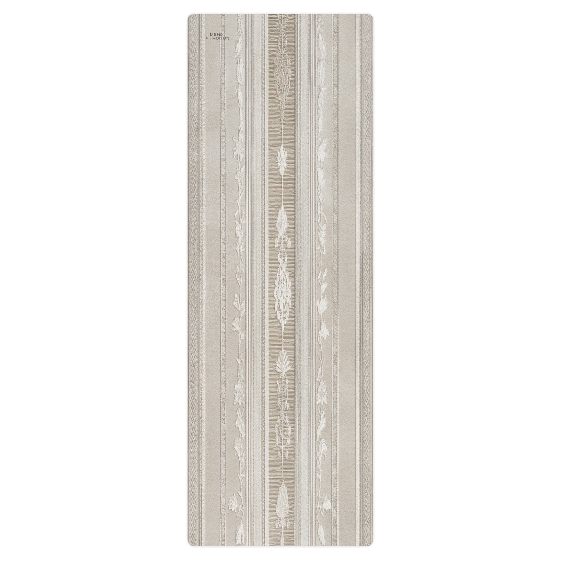 Beige yoga mat with intricate floral and stripe patterns, rolled flat for a detailed top view.
