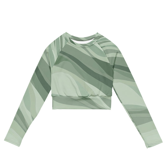 Front view of green long sleeve crop top with unique wave pattern design.