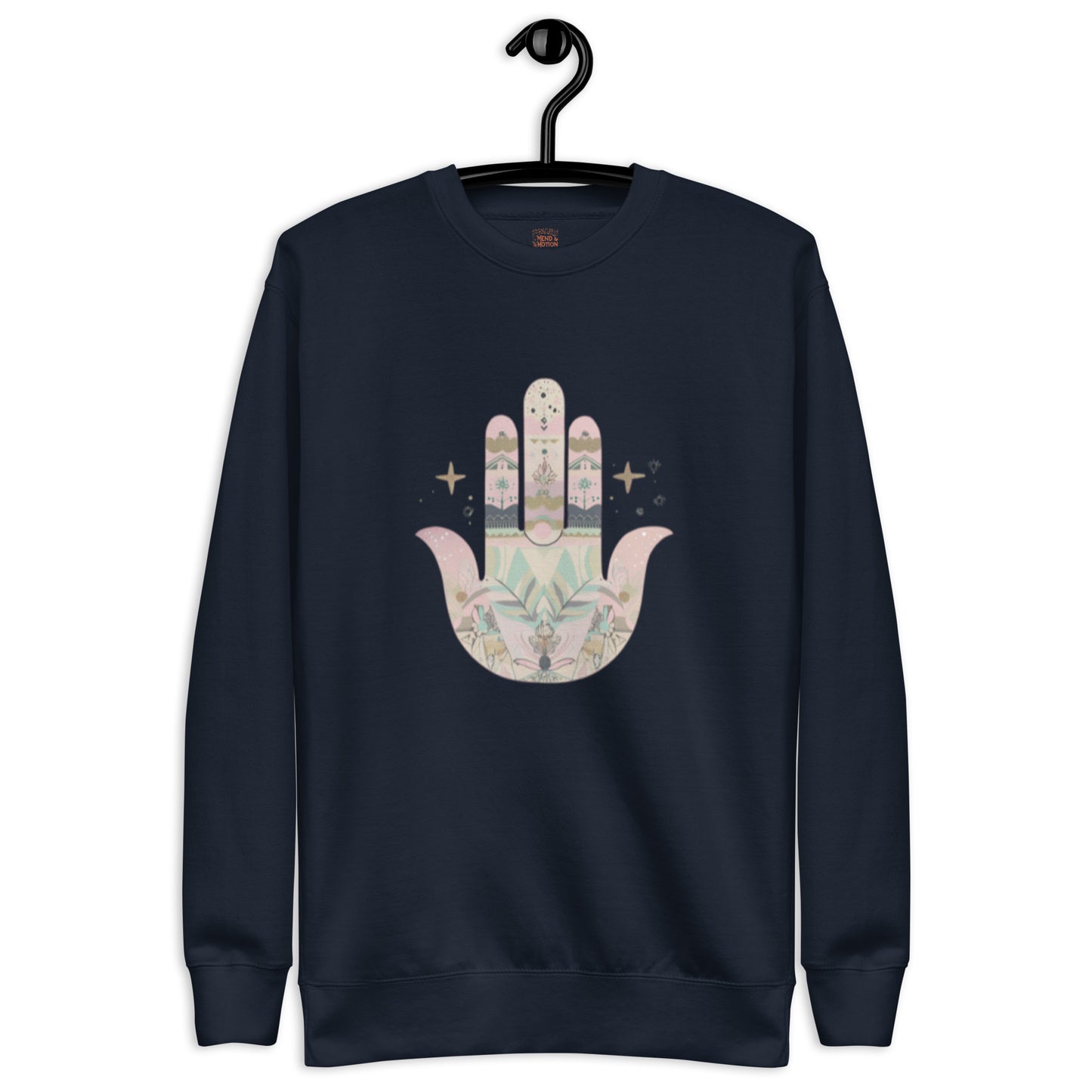 A navy blue sweatshirt featuring a pastel-colored Hamsa hand design with floral and geometric elements, displayed on a hanger.