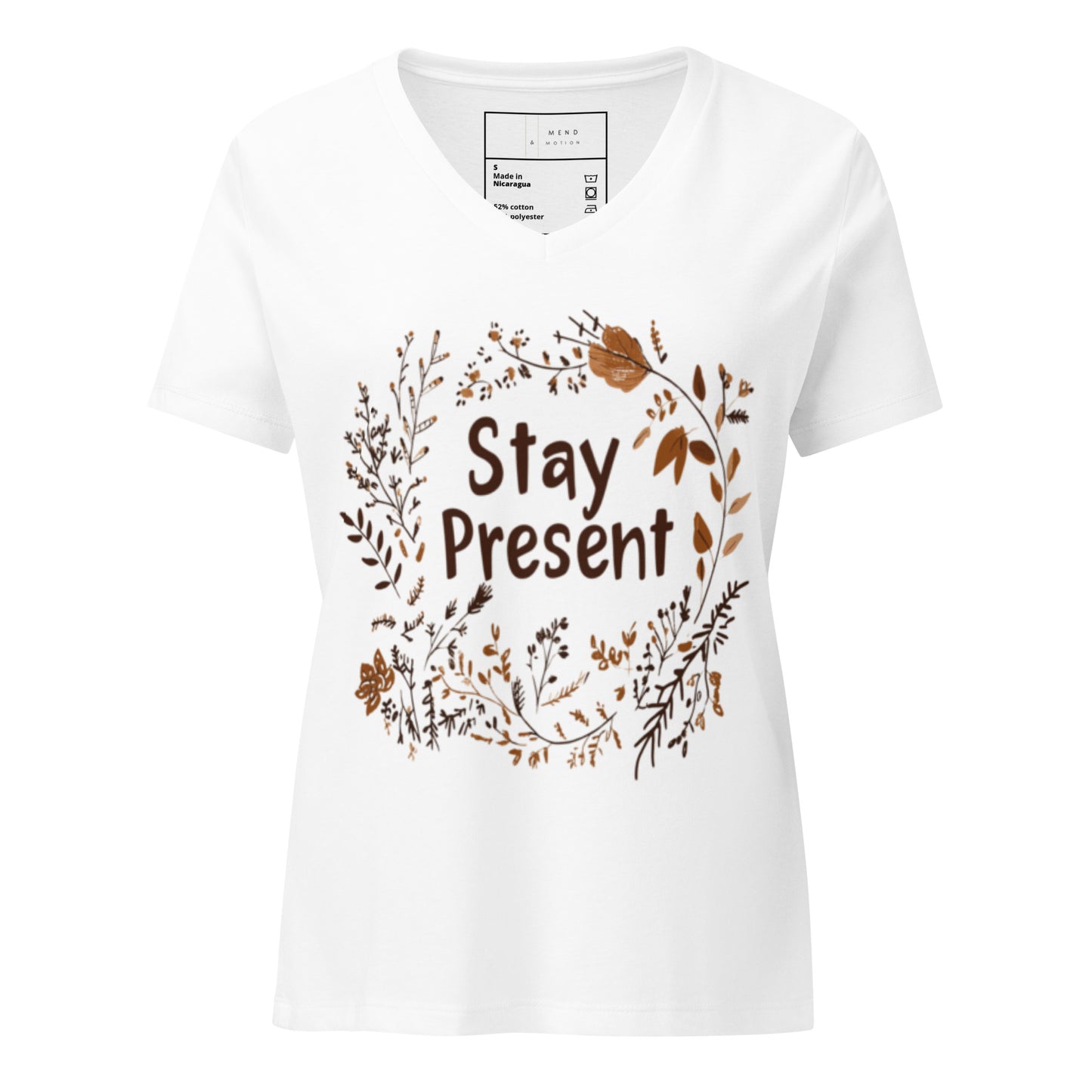  Solid White Stay Present V-Neck Tee with a delicate botanical wreath framing the words 'Stay Present,' ideal for promoting mindfulness and inner peace.