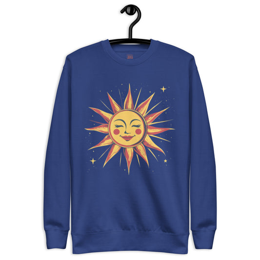 Royal blue sweatshirt with a bright yellow and red sun face centered on a starry night design.