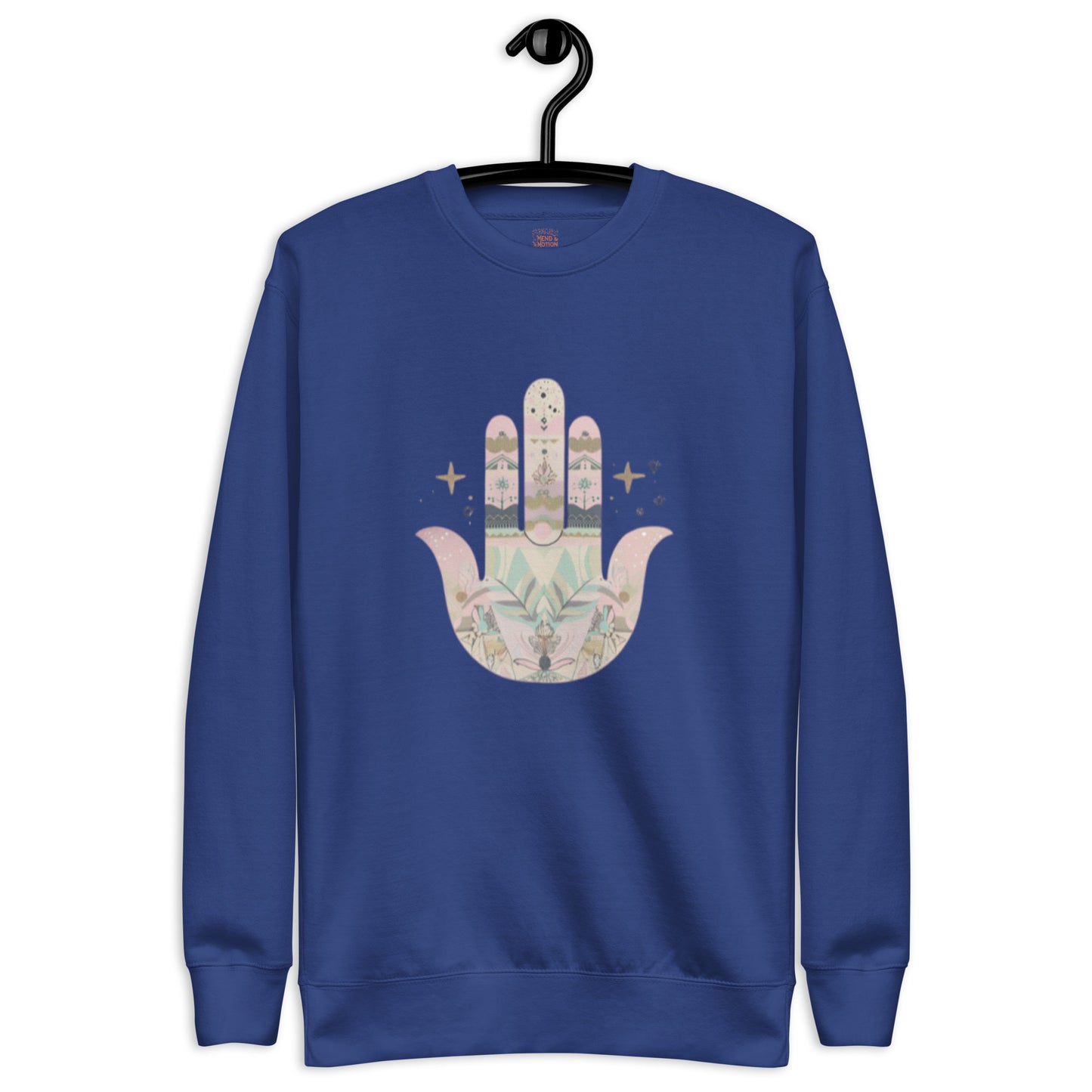 A royal blue sweatshirt featuring a pastel-colored Hamsa hand design with floral and geometric elements, displayed on a hanger.