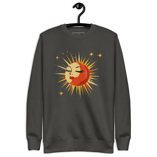 Vintage black sweatshirt displaying a radiant sun and moon graphic surrounded by a field of stars.