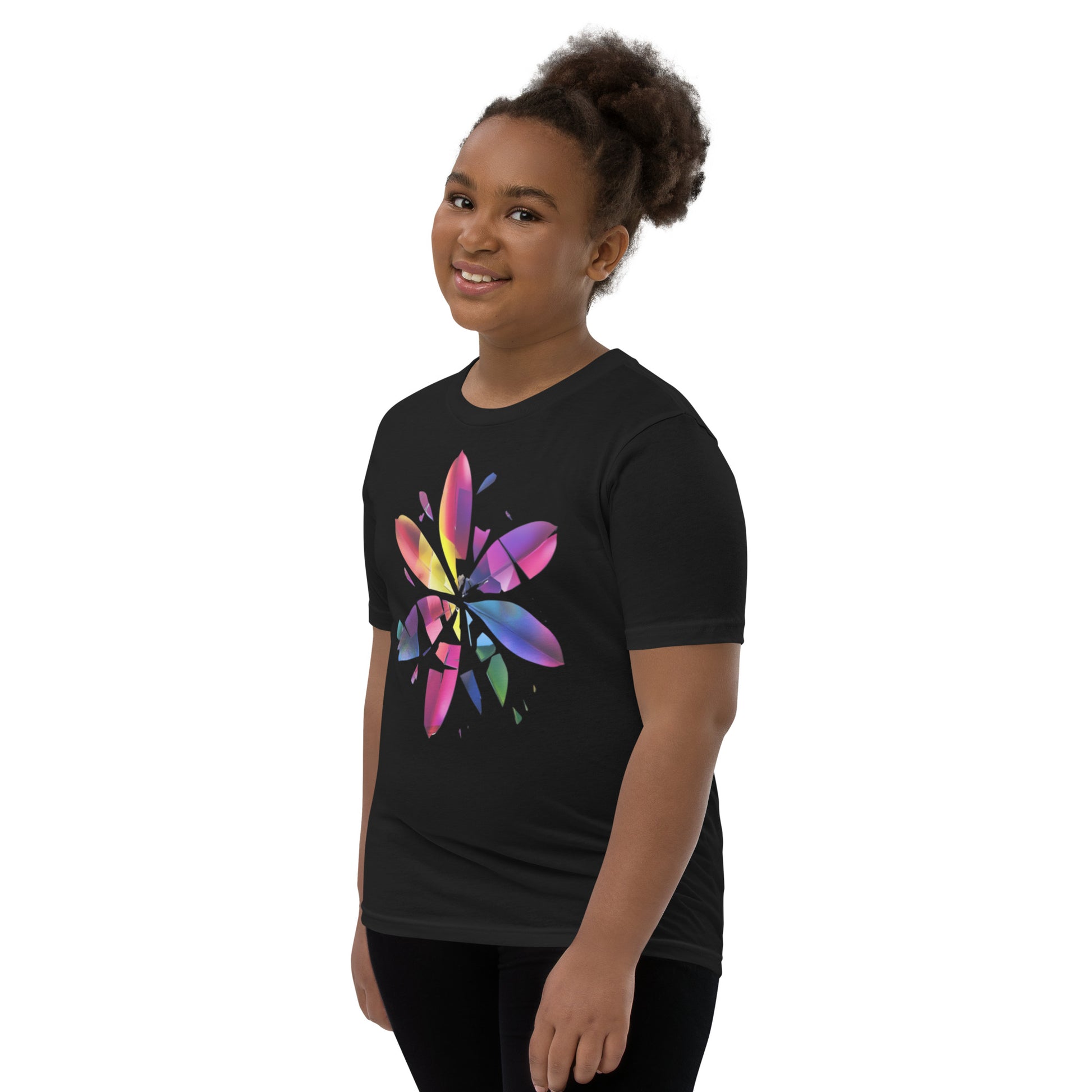 Side view of black youth tee with a vivid rainbow shattered flower design centered on the chest.